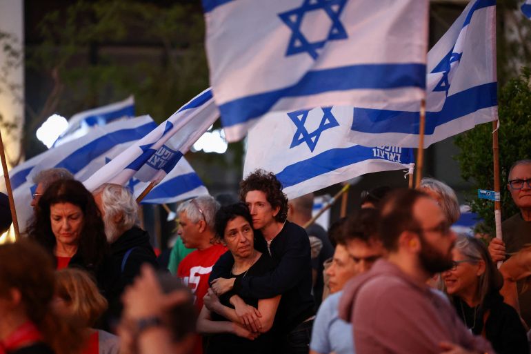 People protest against Israeli Prime Minister Benjamin Netanyahu's government and call for the release of hostages kidnapped in the deadly October 7 attack on Israel by the Palestinian Islamist group Hamas from Gaza, in Tel Aviv, Israel March 30, 2024. REUTERS/Hannah McKay